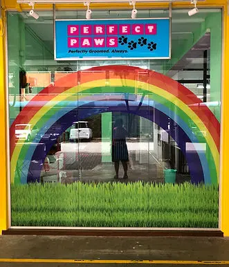 Perfect Paws grooming salon shopfront at Toa Payoh with colourful rainbow display